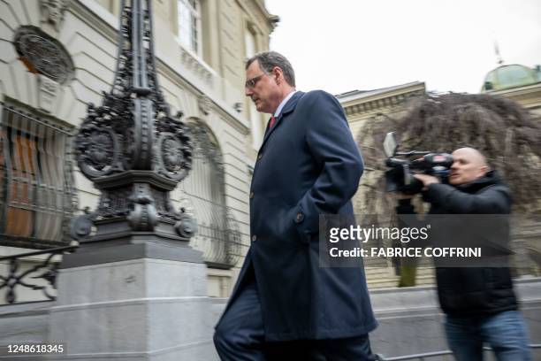 Chairman of the Swiss National Bank Thomas Jordan enters the BNS after talks on Credit Suisse bank crisis in Bern on March 19, 2023. - UBS was up...