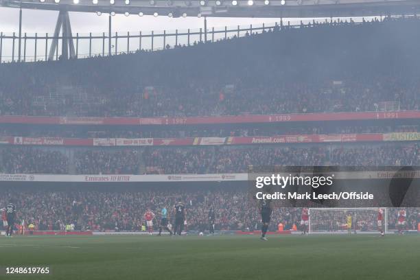 Smoke engulfs the Emirates Stadium at kick off just before the Premier League match between Arsenal FC and Crystal Palace at Emirates Stadium on...