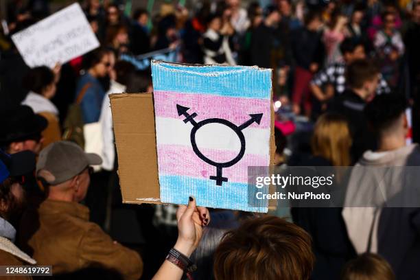 Transgender symbol is seen on a banner during an annual 'Manifa' march in Krakow, Poland on March 18, 2023. This year's 18th edition of Krakow's...