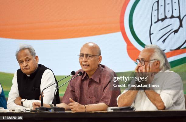 Senior Congress leaders Abhishek Manu Singhvi Jairam Ramesh , and Rajasthan CM Ashok Gehlot addressing a press conference at AICC Headquarters, on...