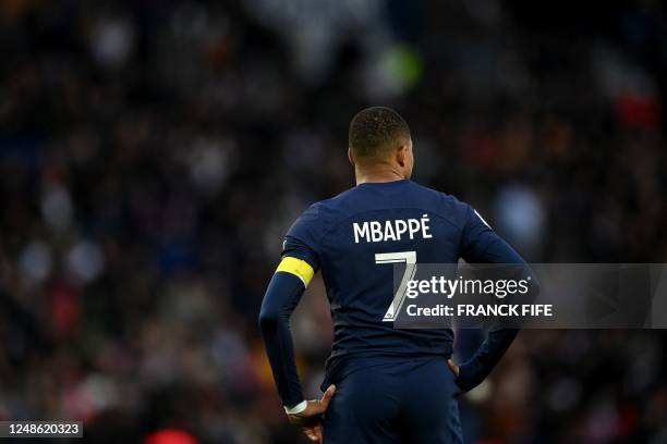 Paris Saint-Germain's French forward Kylian Mbappe reacts during the French L1 football match between Paris Saint-Germain and Stade Rennais FC at The...