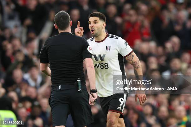 Aleksandar Mitrovic of Fulham receives a red card from Referee Chris Kavanagh during the Emirates FA Cup Quarter Final match between Manchester...
