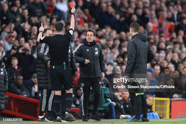 Referee Chris Kavanagh shows the red card and sends off Fulham manager Marco Silva during the Emirates FA Cup Quarter Final match between Manchester...