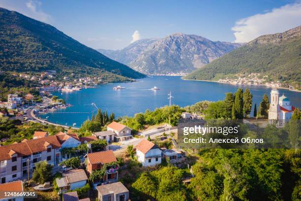 panoramic view on kotor bay and the chapel josice, montenegro. - montenegrin stock pictures, royalty-free photos & images