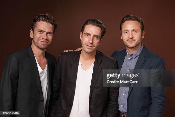 Actor Nikolaj Lie Kaas, director Martin P. Zandvliet and actor Lars Ranthe of "A Funny Man" poses during the 2011 Toronto International Film Festival...