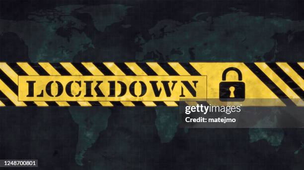textured lockdown horizontal design dirty yellow tape with a padlock on faint world map background - disaster planning stock illustrations