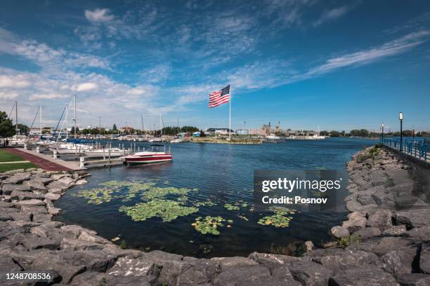 american flag - lake huron stock pictures, royalty-free photos & images