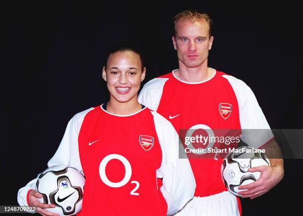 Lianne Sanderson of Arsenal Ladies and Dennis Bergkamp of Arsenal during an Arsenal magazine photoshoot at the Arsenal training ground on November...