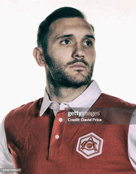 Lucas Perez of Arsenal models a retro Arsenal shirt during an Arsenal Club Day on April 13, 2017 in St. Albans, England.