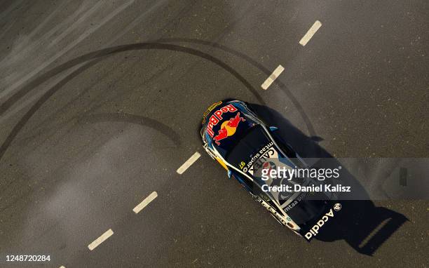 Shane van Gisbergen drives the Red Bull Holden Racing Team Holden Commodore ZB celebrates after winning the Championship during round 10 of the...