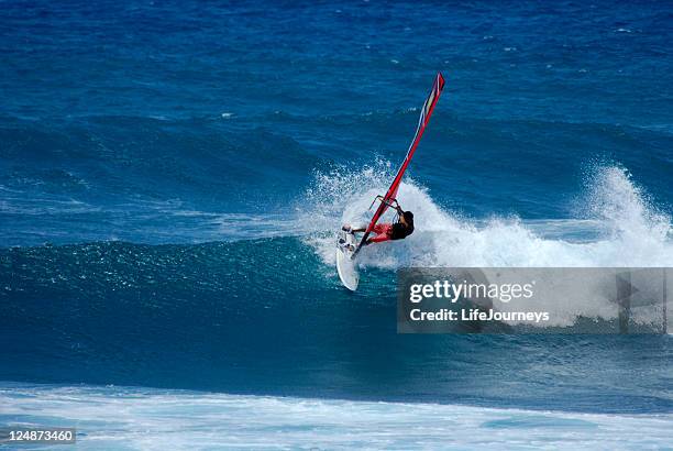 wind surfing - big wave surfing stock pictures, royalty-free photos & images