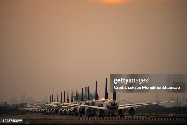 covid-19 made the airline must announce to temporarily stop all routes - suvarnabhumi airport stock pictures, royalty-free photos & images