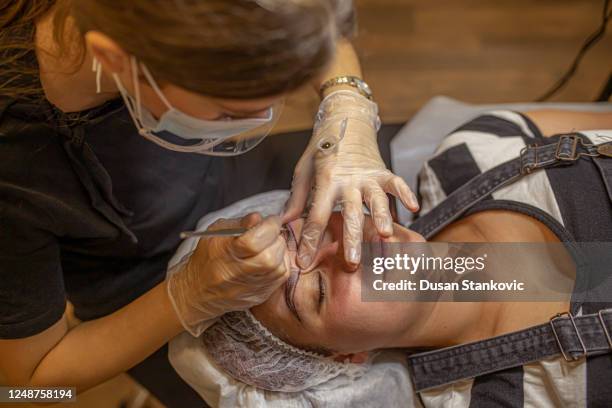 cosmetician preparing for microblading - eyebrow tattoo stock pictures, royalty-free photos & images