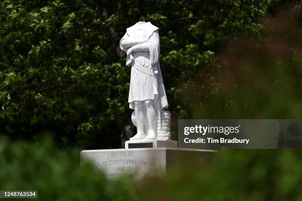 Statue depicting Christopher Columbus is seen with its head removed at Christopher Columbus Waterfront Park on June 10, 2020 in Boston,...