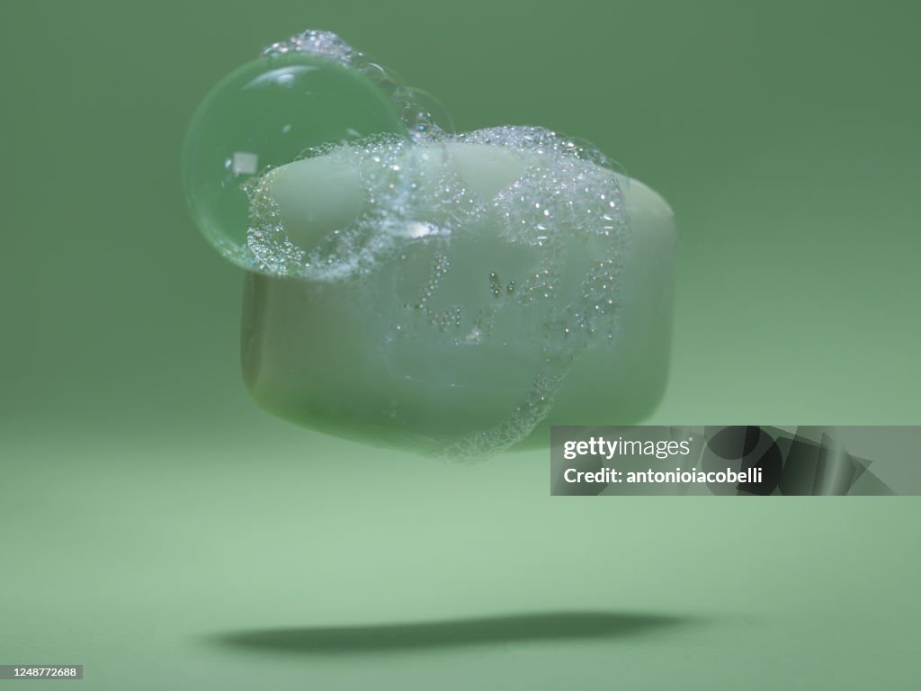 Close-up of a Bar of soap covered in soap suds