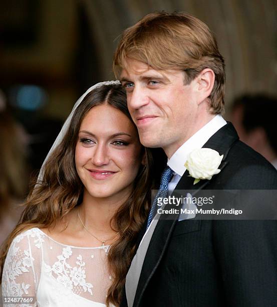Mary-Clare Winwood and Ben Elliot leave the church of St. Peter and St. Paul, Northleach after their wedding on September 10, 2011 in Cheltenham,...