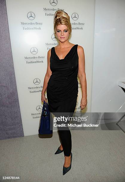 Actress Kirstie Alley poses during Mercedes-Benz Fashion Week Spring 2012 at Lincoln Center on September 13, 2011 in New York City.