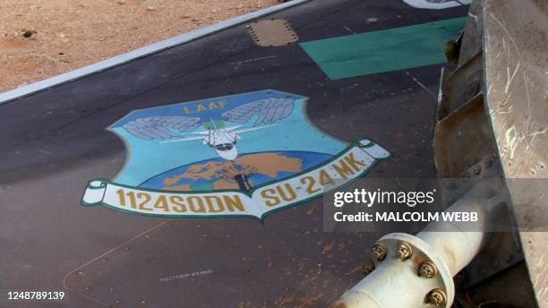 An emblem of the Libyan air force can be seen in this image taken from AFP video of the wreckage of what rebel opposition fighters say was a Sukhoi...