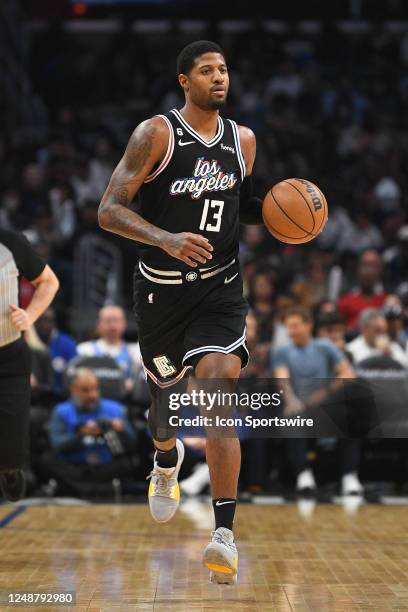 Los Angeles Clippers Guard Paul George dribbles up the court during a NBA game between the Orlando Magic and the Los Angeles Clippers on March 18,...