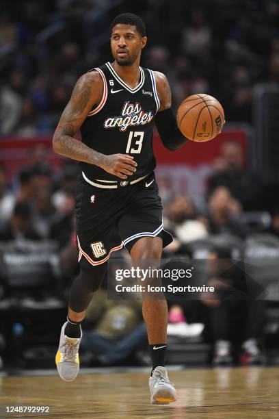Los Angeles Clippers Guard Paul George dribbles up the court during a NBA game between the Orlando Magic and the Los Angeles Clippers on March 18,...