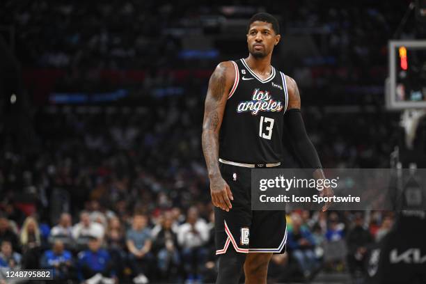 Los Angeles Clippers Guard Paul George looks on during a NBA game between the Orlando Magic and the Los Angeles Clippers on March 18, 2023 at...