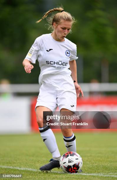 Joana Weber and Lisa Loesch of Bielefeld challenges Joelle Wedemeyer of Wolfsburg during the Women's DFB Cup Semifinal between DSC Arminia Bielefeld...