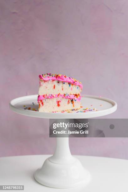 slice of festive cake on cake stand - cake stand stock pictures, royalty-free photos & images