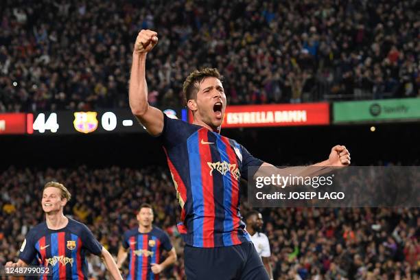 Barcelona's Spanish midfielder Sergi Roberto celebrates after scoring his team's first goal during the Spanish league football match between FC...