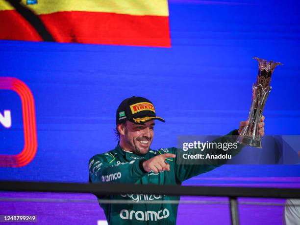 Third placed Fernando Alonso of Spain and Aston Martin F1 Team celebrates on the podium during the F1 Grand Prix of Saudi Arabia at Jeddah Corniche...