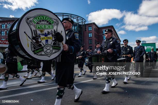 The Boston Police Gaelic Pipes and Drum Column march during the South Boston St. Patrick's Day/Evacuation Day Parade in Boston, Massachusetts on...