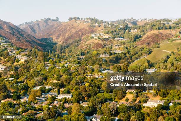 residential houses on the hills in bel air neighborhood, los angeles, california, usa - hollywood hills los angeles stock pictures, royalty-free photos & images