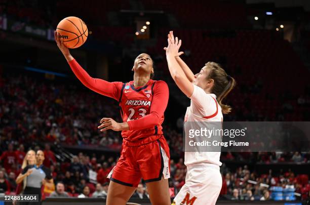 Lauren Fields of the Arizona Wildcats shoots as Abby Meyers of the Maryland Terrapins defends during the first half of the second round of the 2023...