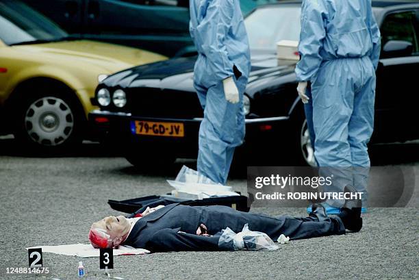Graphic content / Dutch right-wing politician Pim Fortuyn lies dead on the ground outside a radio studio in the central Dutch city of Hilversum, 06...