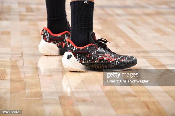 The sneakers worn by Jimmy Butler of the Miami Heat during the game against the Detroit Pistons on March 19, 2023 at Little Caesars Arena in Detroit,...