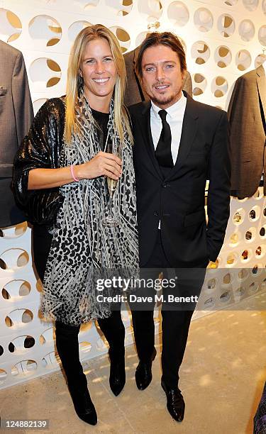 Clare Strowger and Darren Strowger attend the Spencer Hart Brook Street flagship store launch on September 13, 2011 in London, England.