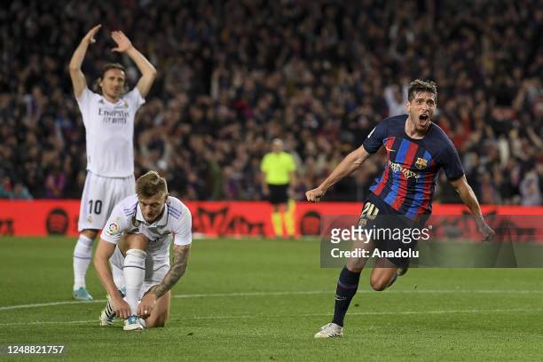 Barcelona's midfielder Sergi Roberto celebrates his goal during the Spanish League football Match between FC Barcelona vs Real Madrid CF at the Camp...