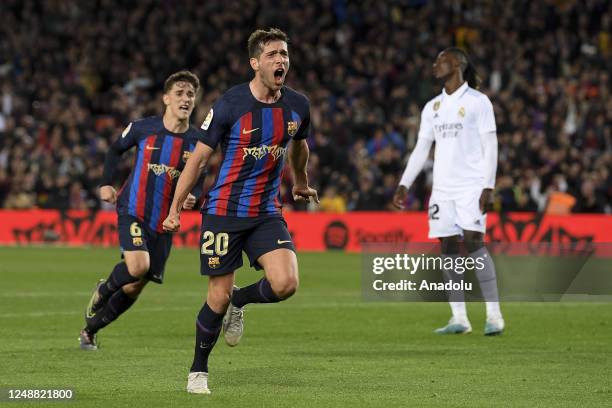 Barcelona's midfielder Sergi Roberto celebrates his goal during the Spanish League football Match between FC Barcelona vs Real Madrid CF at the Camp...