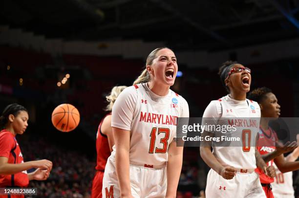Faith Masonius of the Maryland Terrapins and Shyanne Sellers of the Maryland Terrapins react to a basket during the second half in the second round...