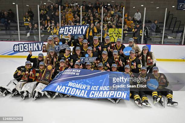 Gustavus Adolphus players celebrate their triple overtime win against Amherst College during the Division III Womens Ice Hockey Championship held at...