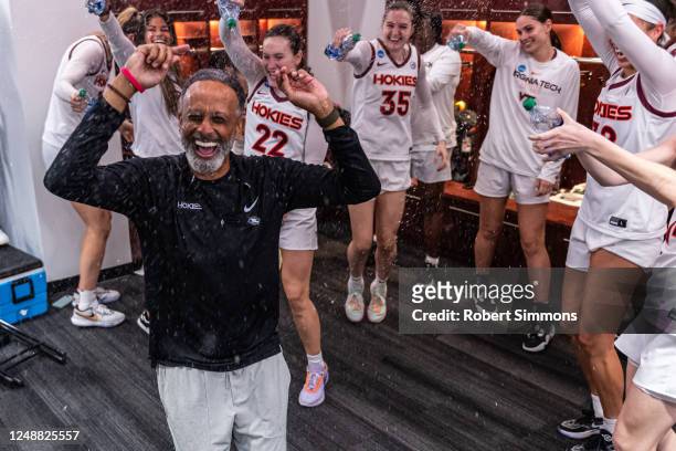 Kenny Brooks head coach of the Virginia Tech Hokies celebrates after their win against South Dakota St. Jackrabbits during the second round of the...