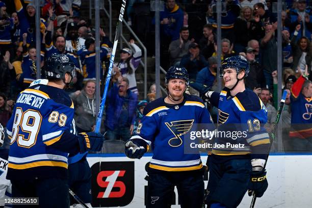 Kasperi Kapanen of the St. Louis Blues is congratulated after scoring a goal against the Winnipeg Jets at the Enterprise Center on March 19, 2023 in...