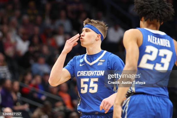 Baylor Scheierman of the Creighton Bluejays reacts to making a 3-pointer against the Baylor Bears during the first half of the second round of the...