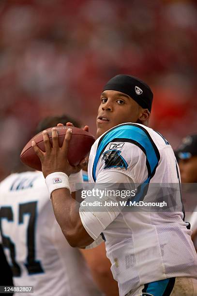 Carolina Panthers QB Cam Newton warming up on sidelines during game vs Arizona Cardinals at University of Phoenix Stadium. Glendale, AZ 9/11/2011...