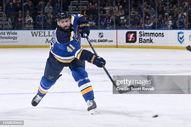 Robert Bortuzzo of the St. Louis Blues takes a shot against the Winnipeg Jets at the Enterprise Center on March 19, 2023 in St. Louis, Missouri.