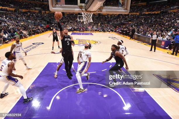 Paolo Banchero of the Orlando Magic drives to the basket during the game against the Los Angeles Lakers on March 19, 2023 at Crypto.Com Arena in Los...