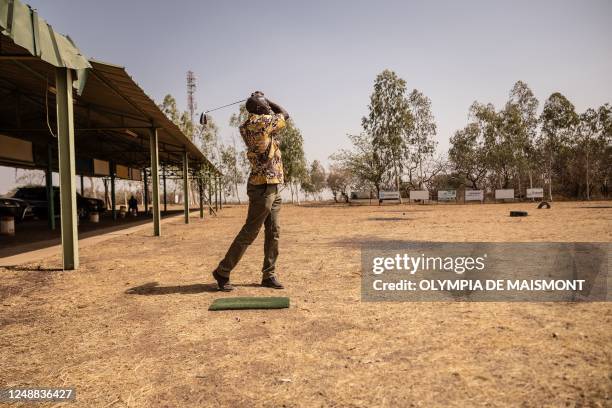 Salif Samaké, president of Ouagadougou's Golf Club, plays golf, in Ouagadougou on February 21, 2023. - When Burkina Faso makes the headlines these...