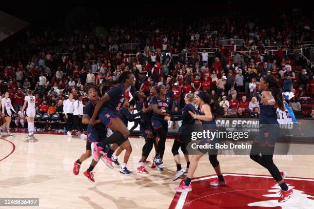 The Ole Miss Rebels celebrate a win against the Stanford Cardinal during the second round of the 2023 NCAA Women's Basketball Tournament held at the...