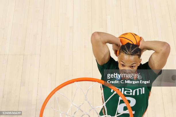Isaiah Wong of the Miami Hurricanes dunks on Indiana Hoosiers during the second half during the second round of the 2023 NCAA Men's Basketball...