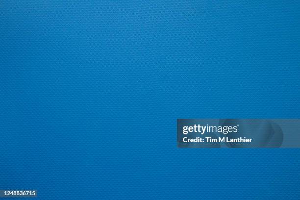 blue patterned background - colchoneta de ejercicio fotografías e imágenes de stock