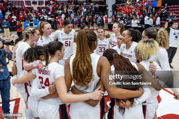 Stanford players huddle after their loss during the second round of the NCAA Womens Basketball Tournament between the Ole Miss Rebels and the...